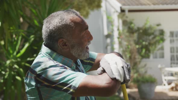 Senior man gardening on a sunny day