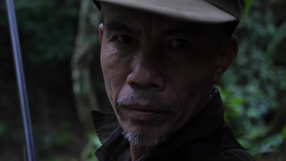 Face Of Asian Senior Hunter In Forrest