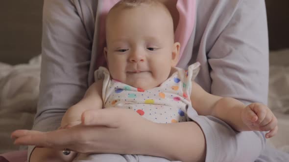 Baby Girl Likes Clapping Mothers Hand