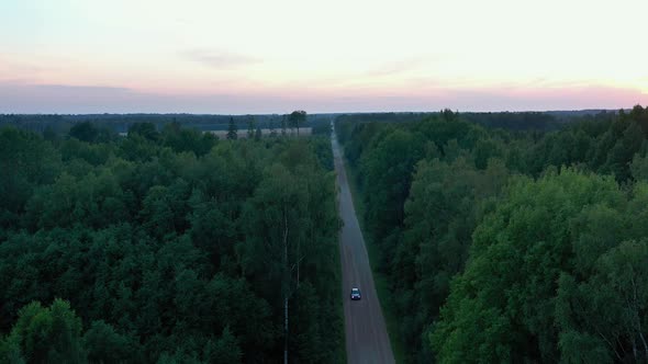 Car on Forest Road