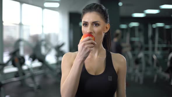 Sport Female Eating Apple After Workout, Balanced Nutrition, Active Lifestyle