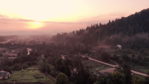 Foggy Morning Landscape at Sunrise