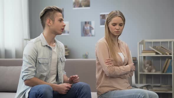 Guy Making Excuses to Girlfriend Who Suspects Him of Betrayal, Explaining Reason