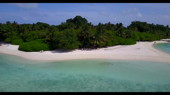 Aerial flying over texture of beautiful island beach vacation by aqua blue ocean with white sand bac