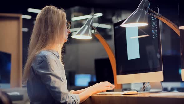 Tired Worker Overworked On Computer. Frustrated Businesswoman Working Alone. Office Work Overtime.