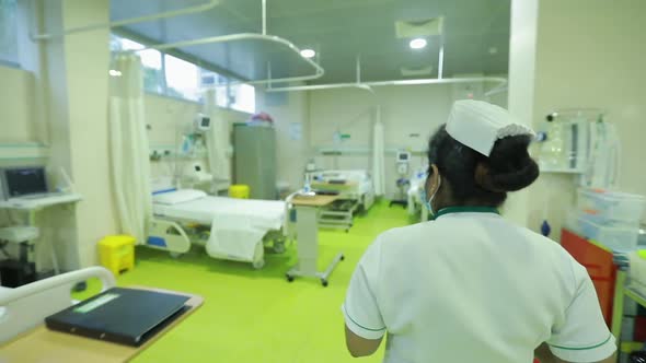 Nurse Walks Through Emergency Room