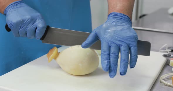 Cutting Provolone