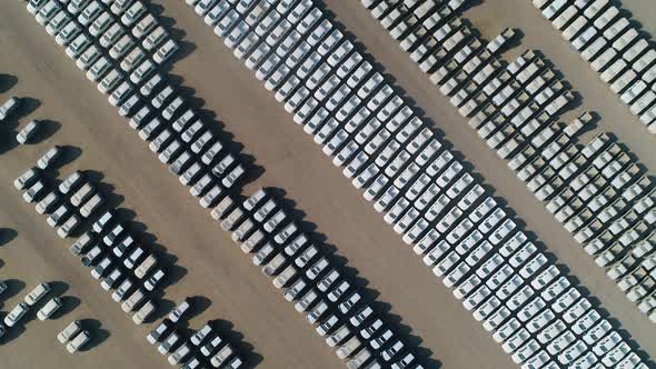 Aerial view of group of cars at parking space on a desert landscape, U.A.E.