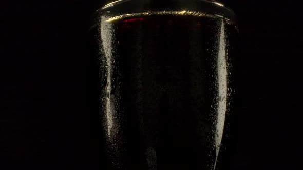 Wet Glass with Fizzling Cola