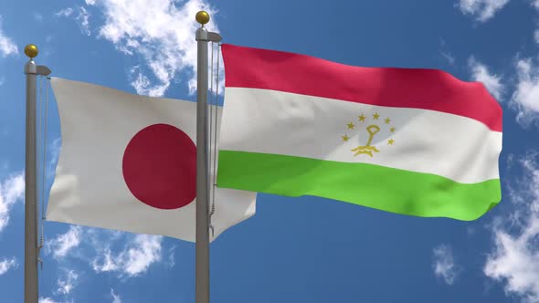 Japan Flag Vs Tajikistan Flag On Flagpole