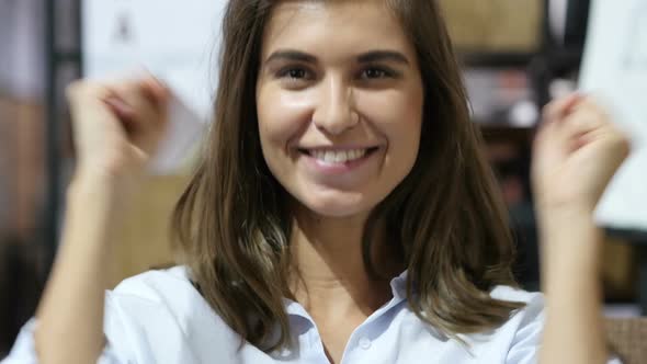 Excited Girl Celebrating Success with Joy, Portrait