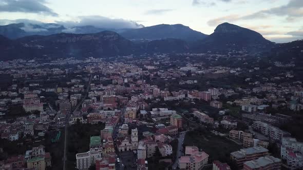 Birds eye view of the coastal town of Sorrento in Italy at sunset or sunrise, a beautiful landscape