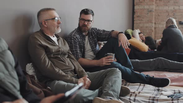 Men Talking in Refuge