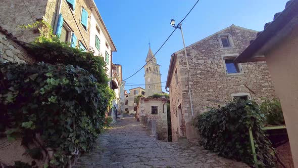 Hand-held video of a walk through the historic center of the Croatian town of Motovun during the day
