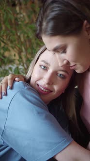 Two Young Pretty Lgbt Ladies are Sitting Together Hugging and Enjoying Each Other