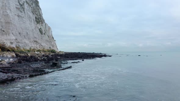 Low aerial shot of white cliffs of dover beach