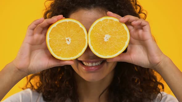 Beautiful Girl With Oranges on Eyes, Vitamins for Healthy Skin, Natural Cosmetic