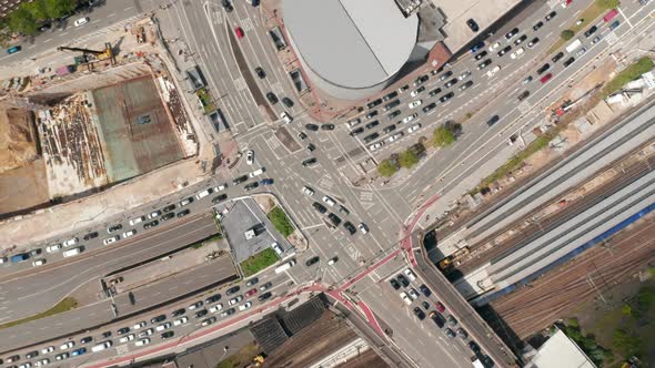 Aerial Birds Eye Overhead Top Down View of Traffic in Town Streets in Rush Hour