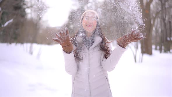 Young asian woman enjoy smile around snow and winter