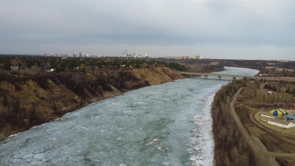 Fly Towards Quesnell Bridge with Downtown Edmonton in Distance