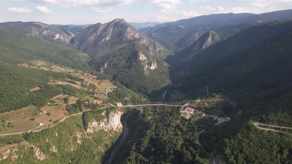 Aerial view of Tara river canyon, mountains and bridge, Montenegro, Europe