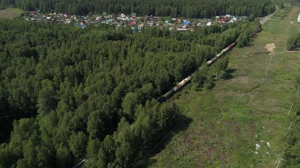 Aerial view of Freight train of oil tank cars travels by railway. 08