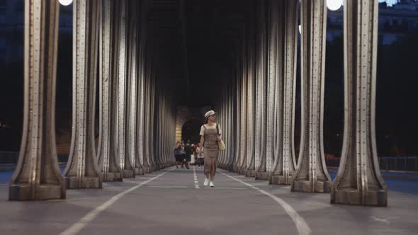 Walking young girl in the evening