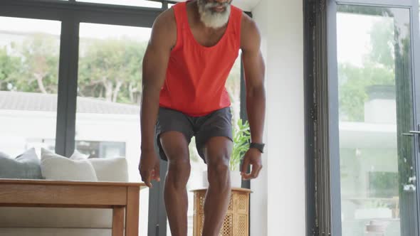 Video of african american senior man practicing at home