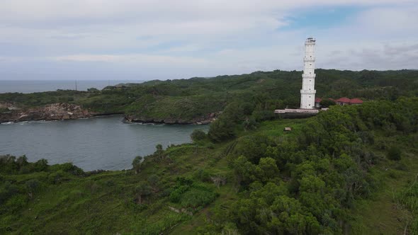 Aerial view of the lighthouse in Indonesian beach