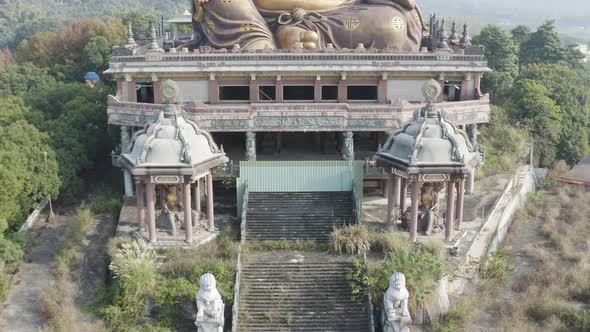 Ascending Camera View with front facing of The Spectacular Gigantic Golden Maitreya Buddha Sculpture