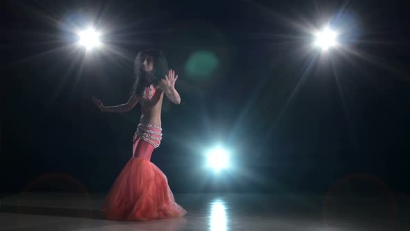 Beautiful Slim Woman Belly Dancer Dancing, on Black, Back Light