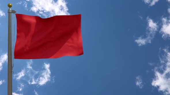 Red Flag On Flagpole