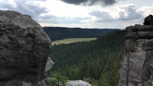 Walk through the rock blocks. Bare rocks high in the mountains. Rock town. Taken in Sto?owe Mountain