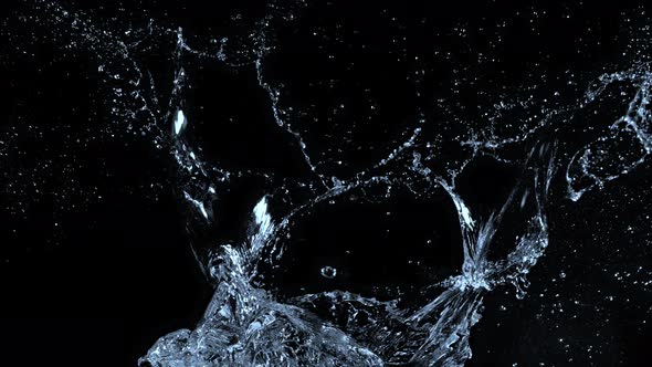 Super Slow Motion Shot of Water Splash at 1000Fps Isolated on Black Background