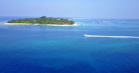 Daytime above abstract view of a paradise sunny white sand beach and blue ocean background in vibran