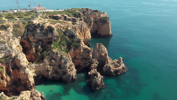 Stunning scarps surrounding Ponta da Piedade lighthouse, Lagos Algarve, Portugal