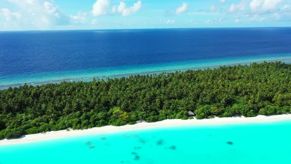 Aerial top down nature of idyllic seashore beach voyage by blue green sea and white sandy background