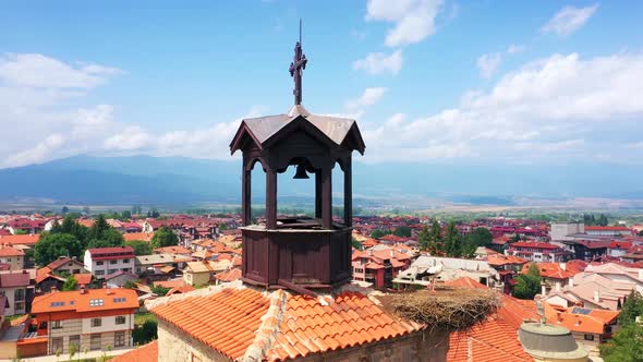 Flying Сopter Aerial Houses In Town Near Mountain Range