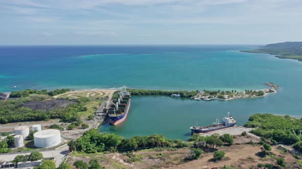 Two ships moored at bay of Barahona port, Dominican Republic. Aerial panoramic view