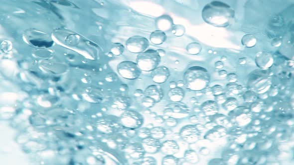 Super Slow Motion Shot of Oil and Water Blue Whirl at 1000Fps alt