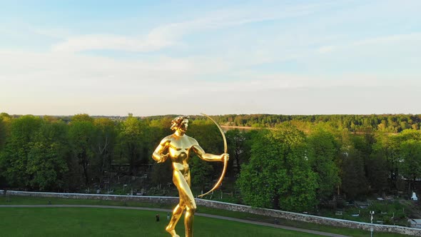 Spin Around Man With Bow Statue In Siauliai