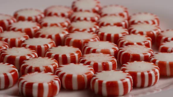 Rotating shot of peppermint candies - CANDY PEPPERMINT 042