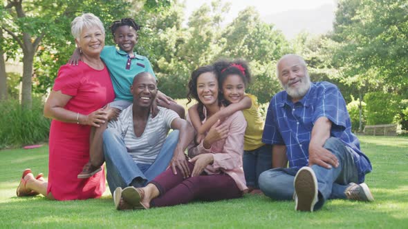  Multi-generation African American family spending time in the garden together