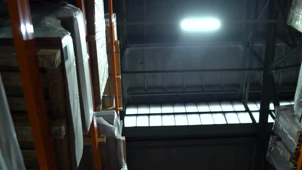 Retail Warehouse Full of Shelves with Goods in Cardboard Boxes