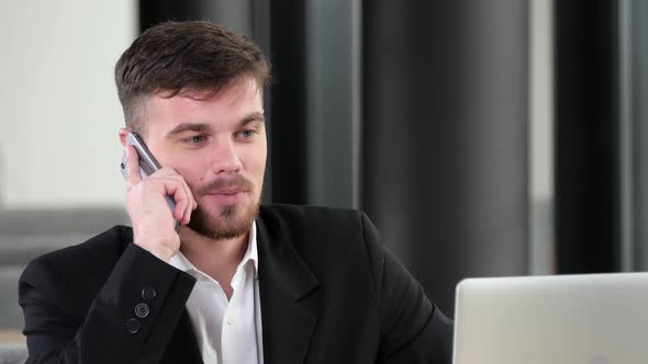 Office Worker Made a Deal Talking on a Mobile Phone