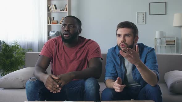 Men Watching Sport Event on Tv, Expressing High Expectation and Disappointment