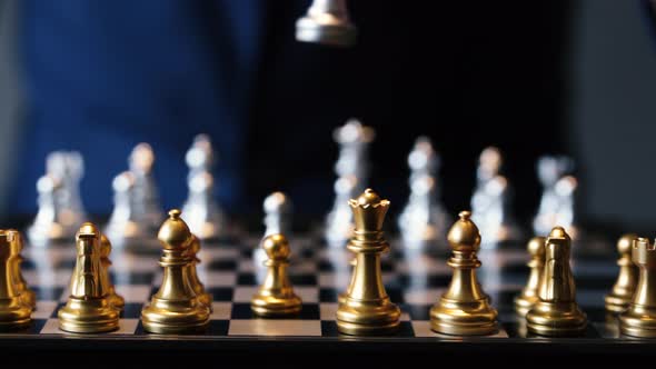 Cropped Shot of Businessman Playing Chess