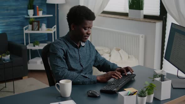 Authentic Smiling Black African American Man Working From Home