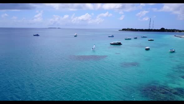 Aerial drone view nature of relaxing sea view beach time by shallow ocean with white sandy backgroun