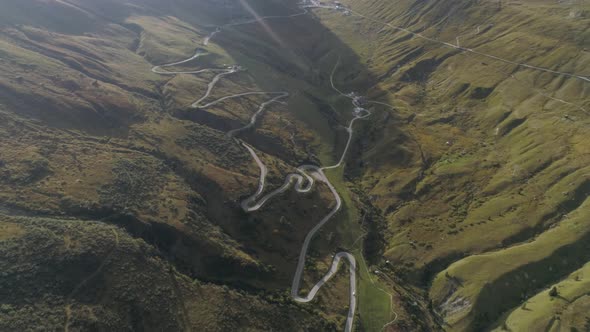 Aerial of a Mountain Road in the Italian Dolomites during Sunset